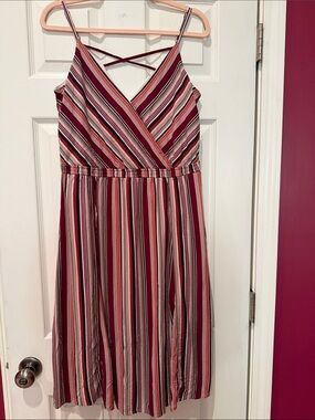 MAURICES.   Striped wrap around style dress with interesting straps in back.